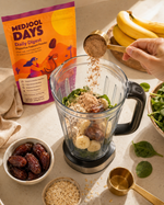 Daily Digest scoop poured into smoothie blender with dates and oats