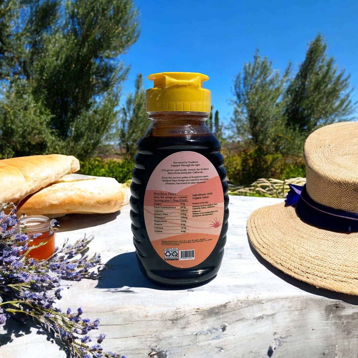 Back label of Medjool Days organic date syrup bottle showing nutrition facts and ingredients – premium all natural date molasses.