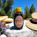 Back label of Medjool Days organic date syrup bottle showing nutrition facts and ingredients – premium all natural date molasses.